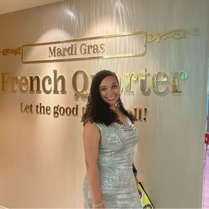 Silver dress, mid length. Great for formal night/wear.